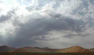 Bild: Wolken über den Dünen