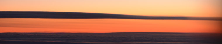 Bild: Sonnenuntergang vom Flugzeug aus